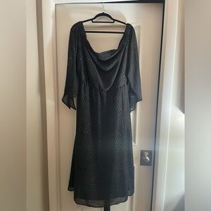 Black (with multi-colored flecks), long flowing dress, off the shoulder